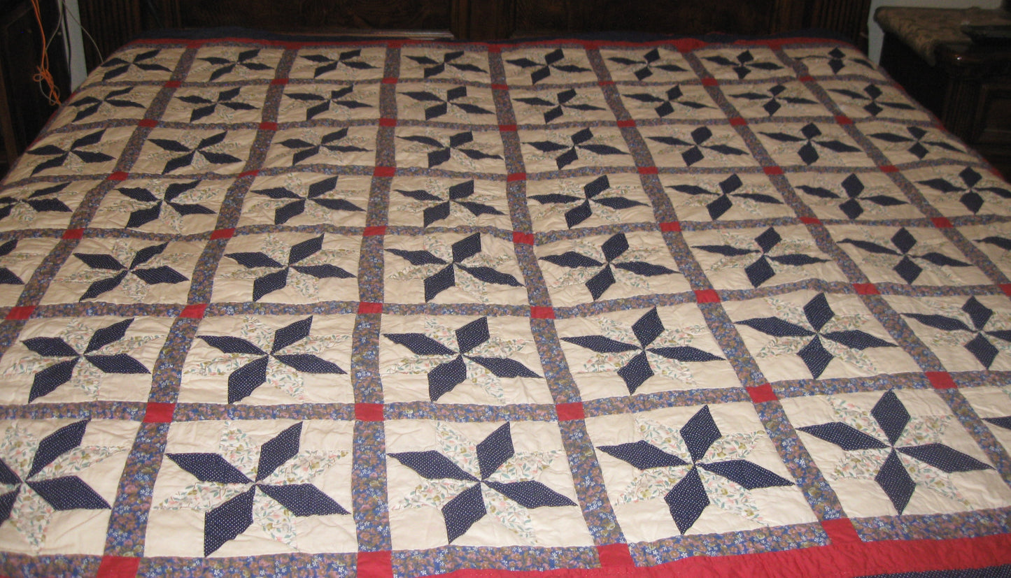 HAND STITCHED QUILT - BLUE AND RED PINWHEEL